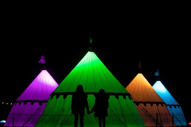 Christmas at Warwick Castle - Light Trail & Ice Skating Packages - Warwick Castle after dark