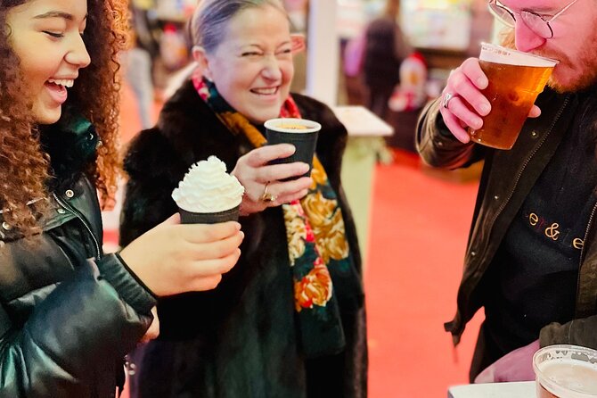 Christmas Lights and Markets Guided Walking Tour with Mulled Wine - Covent Garden: lights, stalls, and street life