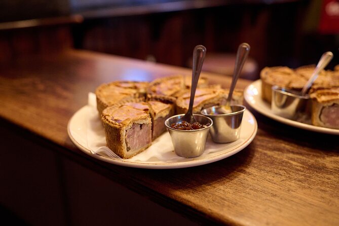 Devour London Historical Pub Tour:Traditional British Food & Ales - Starting at Ye Olde Mitre with pork pie and London Pride
