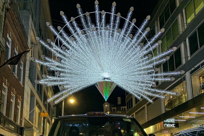 London Bespoke Black Cab Christmas Lights & Sights Private Tour - Harrods keeps the classic London mood going