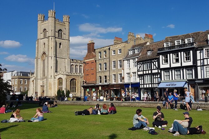 Tangential Cambridge: Group Walking Tour of Sights and Highlights - St Johns Street and the mysterious figures